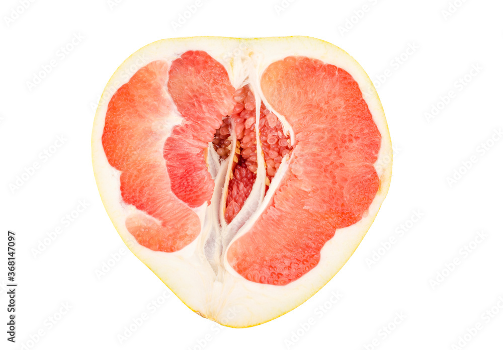 Halves of red chinese sliced pamelo on white background. Halves of red chinese sliced pamelo on white background.