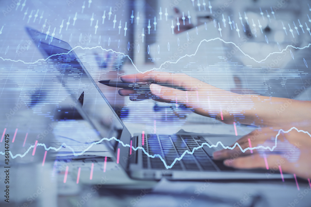 Multi exposure of woman hands typing on computer and financial graph hologram drawing. Stock market analysis concept. Multi exposure of woman hands typing on computer and financial graph hologram drawing. Stock market analysis concept.