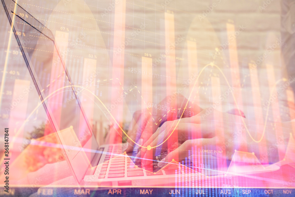 Multi exposure of woman hands typing on computer and forex chart hologram drawing. Stock market analysis concept. Multi exposure of woman hands typing on computer and forex chart hologram drawing. Stock market analysis concept.