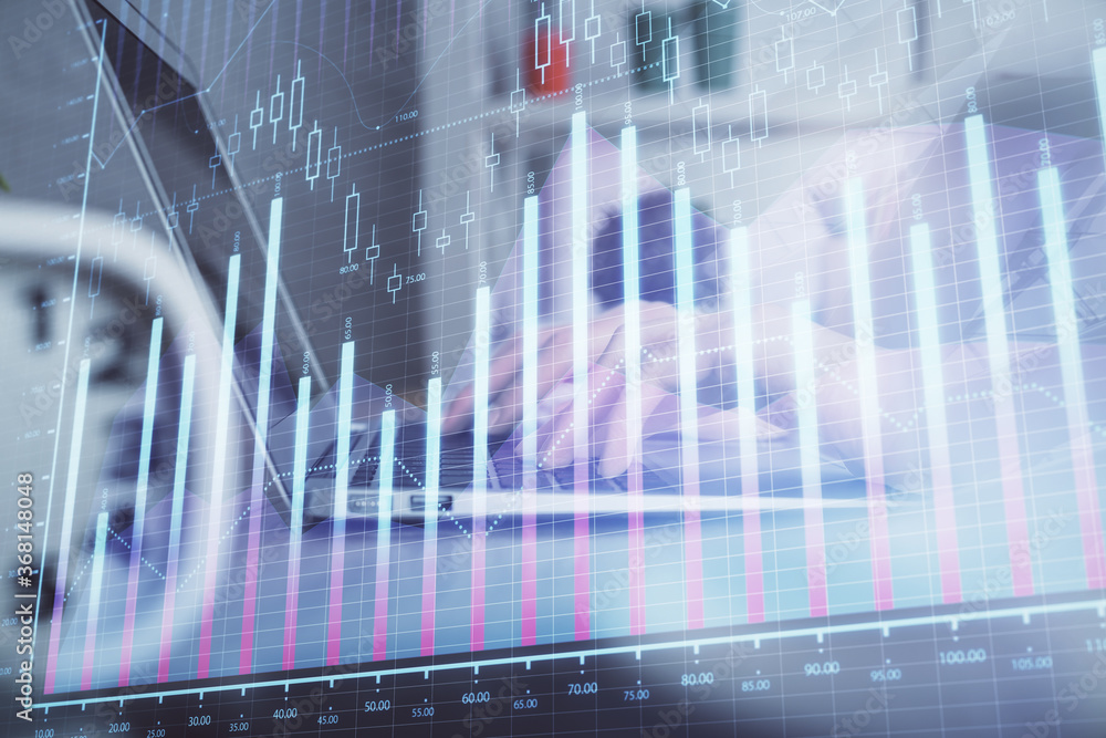 Double exposure of woman hands typing on computer and forex chart hologram drawing. Stock market invest concept. Double exposure of woman hands typing on computer and forex chart hologram drawing. Stock market invest concept.
