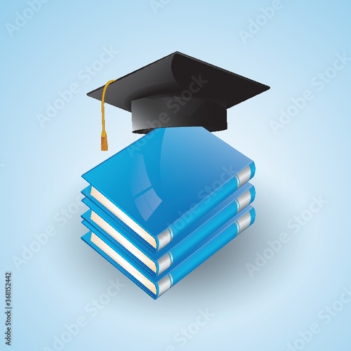 mortarboard and books