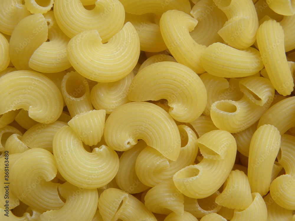 Yellow color raw dried Chifferi Rigati pasta Yellow color raw dried Chifferi Rigati pasta