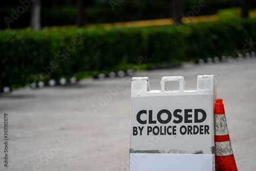 Photo parking lot sign closed by police order