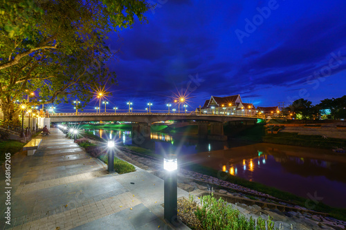Natural evening In front of the at Wat Phra Si Rattana Mahathat also colloquially referred to as Wat Yai at view the Nan River and  the park for relaxing walking at sunset in Phitsanulok, Thailand.