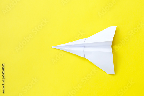 assembly procedure of a paper white airplane. Origami. C