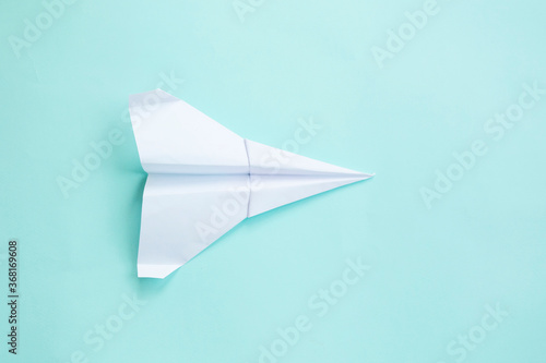 assembly procedure of a paper white airplane. Origami. C
