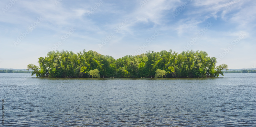 small foresty island on a big lake, summer lake scene small foresty island on a big lake, summer lake scene