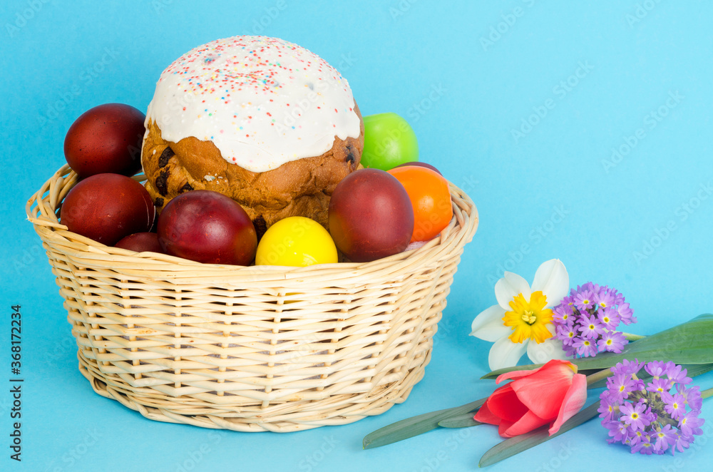 Delicious Easter cake, colored eggs for Easter celebration.