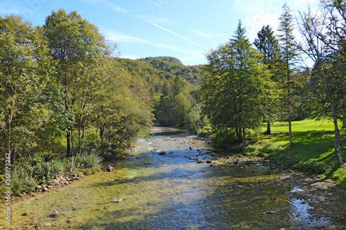 Fototapeta Naklejka Na Ścianę i Meble -  Top view of a small mountain river on a sunny day.