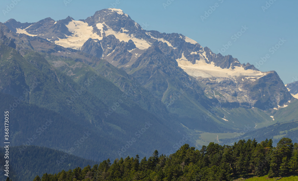 Fototapeta premium mountain ridge in a snow and ice, outdoor mountain travel scene