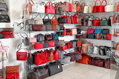 Stylish bags in interior of...