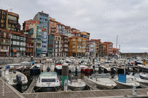 The magnificent port of Bermeo under a cloudy sky in the Basque Country