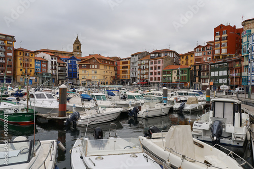 The magnificent port of Bermeo under a cloudy sky in the Basque Country © M.Etcheverry