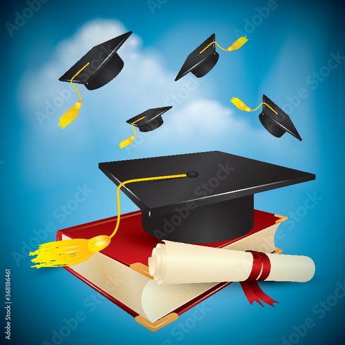 graduation cap and scroll on a book