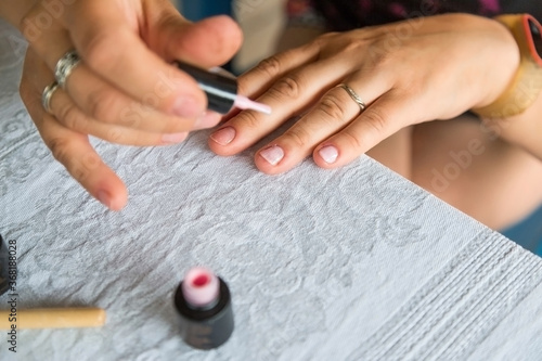 Staining nail gel polish. Self-manicure during self-isolation