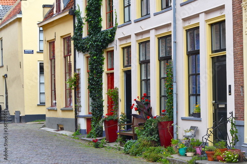Ancient street "Broederenkerkstraat" and houses in old historic city Zutphen, the Netherlands
