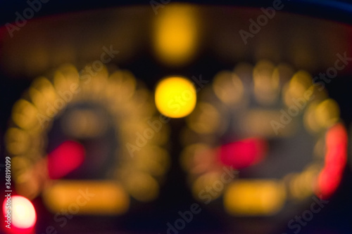 Blurred of Car instrument panel that mean the car speedometer,