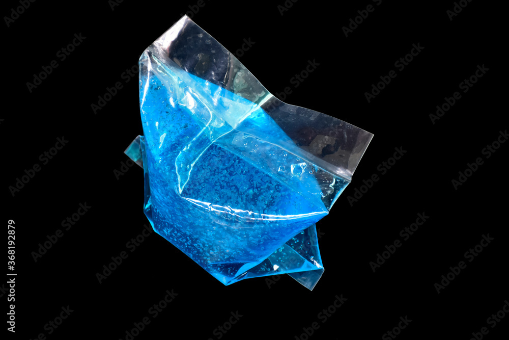 The blue temperature gel is placed on a black background The blue temperature gel is placed on a black background