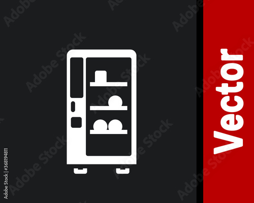 White Vending machine of food and beverage automatic selling icon isolated on black background. Vector.