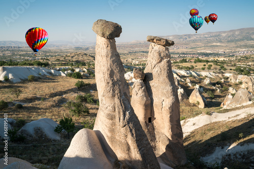 Cappadocia fairy chimneys and hot air balloons. Kapadokya is known as one of the best places to fly with hot air balloons worldwide. Goreme, Cappadocia, Turkey.