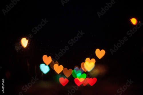 Blurry urban street lights, heart bokeh soft focus