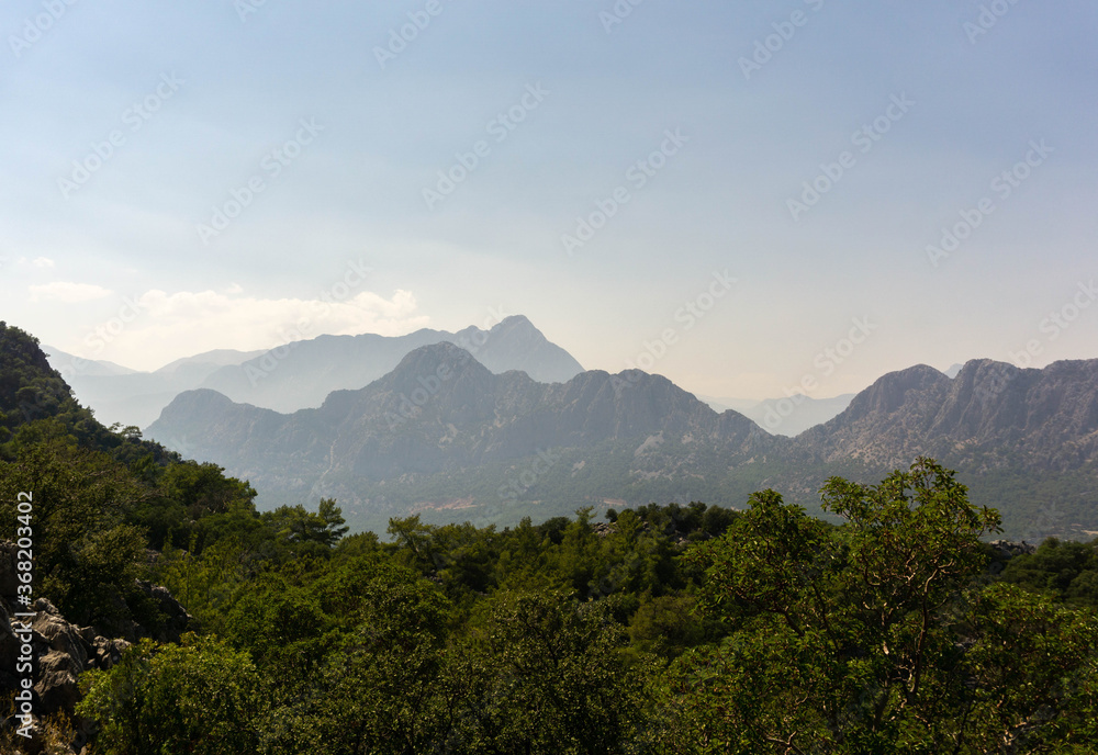 Fototapeta premium incredibly landscape against the backdrop of majestic mountains, summer