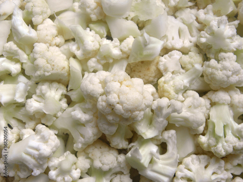 Diced cut white color raw Cauliflower florets photo