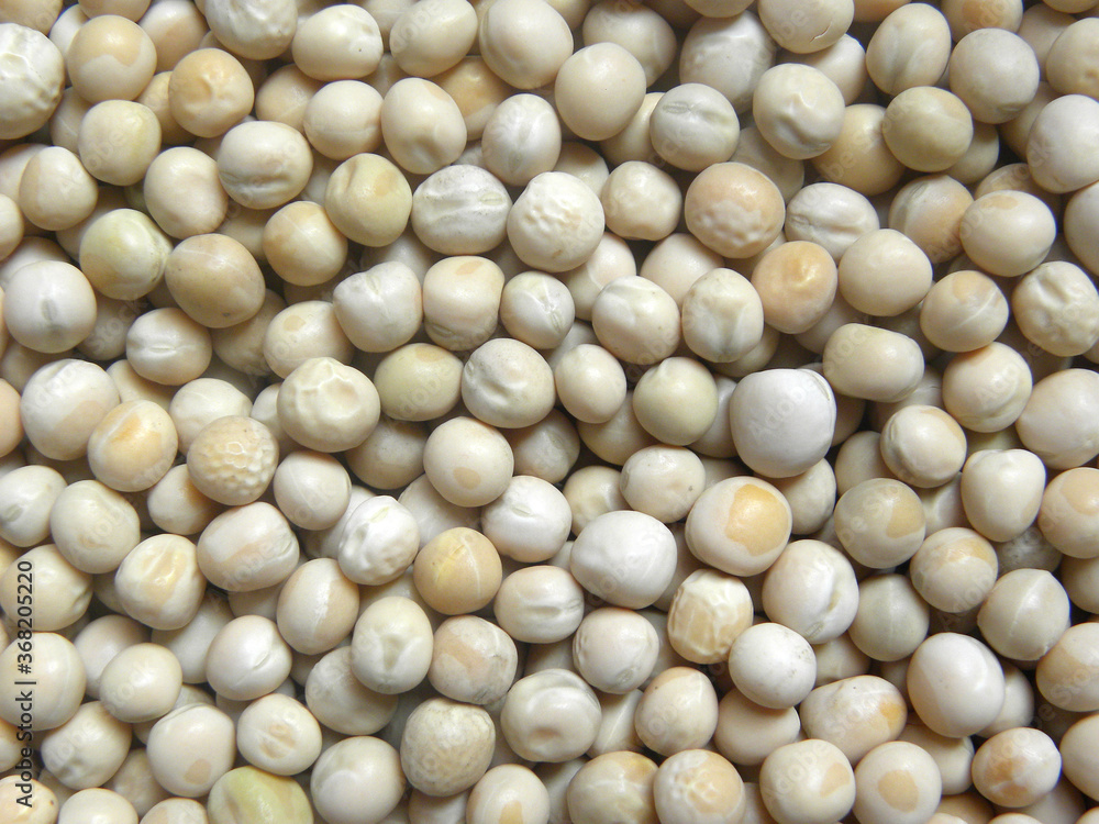 Beige and white color raw whole dried peas