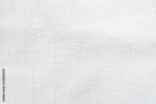 Fabric backdrop White linen canvas crumpled natural cotton fabric Natural linen top view background Organic Eco textiles White Fabric texture