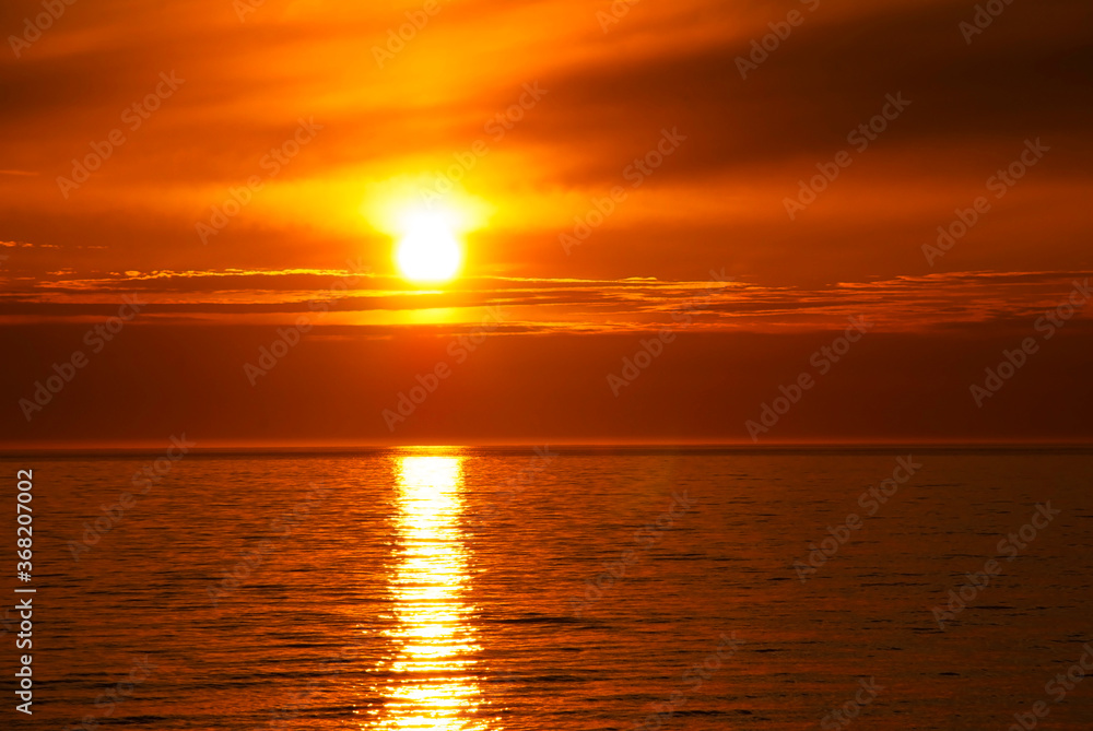 Romantic Sunset Or Sunrise At Sea Or Ocean. Beautiful Landscape And Scenery
