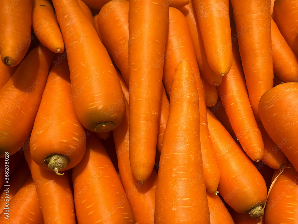 Carrots are a raw material used for cooking and  healthy food.
