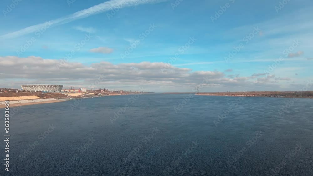 Zoom Out Timelapse Of Water And Ice Flowing Along Volga River. Volgograd, Russia. Zoom Out Timelapse Of Water And Ice Flowing Along Volga River. Volgograd, Russia.