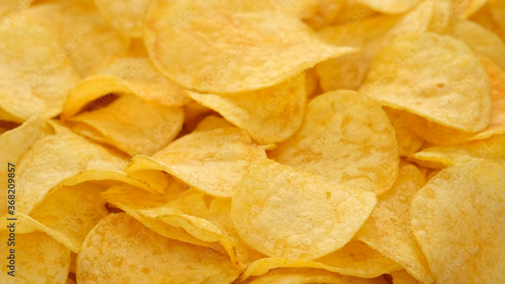 craft potato chips with cheddar cheese, close up