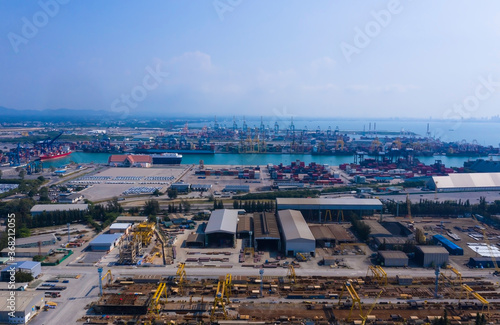 Port of aerial view a Logistics and transportation of Container Cargo ship which import and export as a international harbor