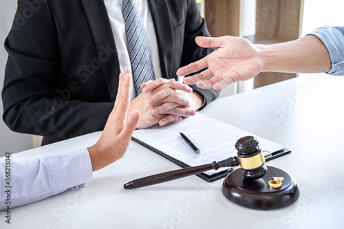 Man and wife conversation during divorce process with male lawyer