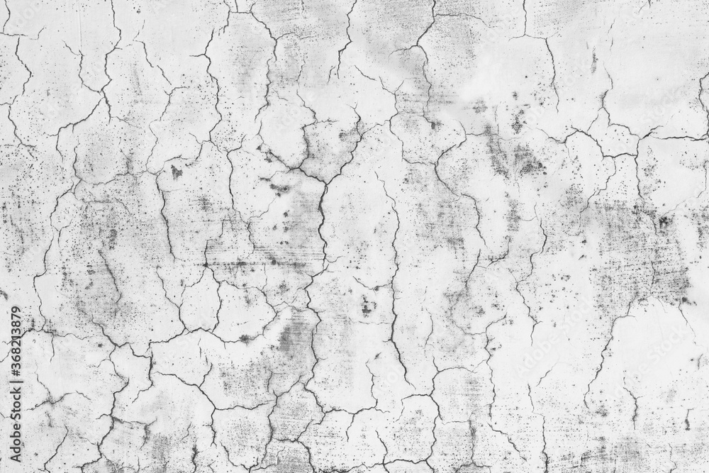 Fototapeta premium White wall in the cracks. Abstract white texture or background.