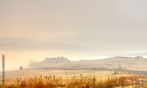 WINTER VIEWS OF FARMLANDS AND FOOTHILLS OF SOUTHERN DRAKENSBERG
 Kwazulu Natal, South Africa. 