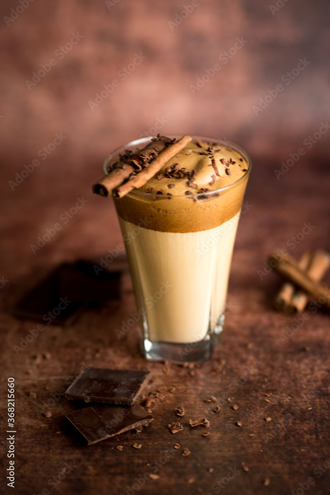 Iced Dalgona Coffee, a trendy fluffy creamy whipped coffee Iced Dalgona Coffee, a trendy fluffy creamy whipped coffee
