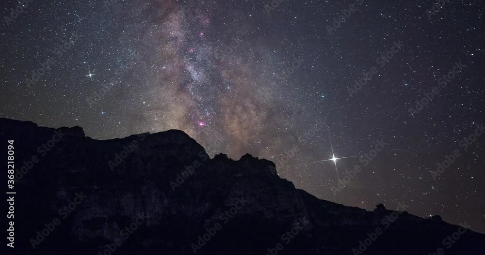 Night Sky Time Lapse, Moving Starry Dark Black Landscape, Planet Jupiter, Venus, Stars and Milky Way Galaxy Above Mountains In Georgia Borjomi National Park In Summer Midnight Night Sky Time Lapse, Moving Starry Dark Black Landscape, Planet Jupiter, Venus, Stars and Milky Way Galaxy Above Mountains In Georgia Borjomi National Park In Summer Midnight