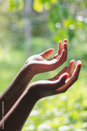 A man his praying hand for God's blessing To ask for your help In a state of depression from the kovid-19, he was affected both physically and mentally,and hope that everything would be well soon.