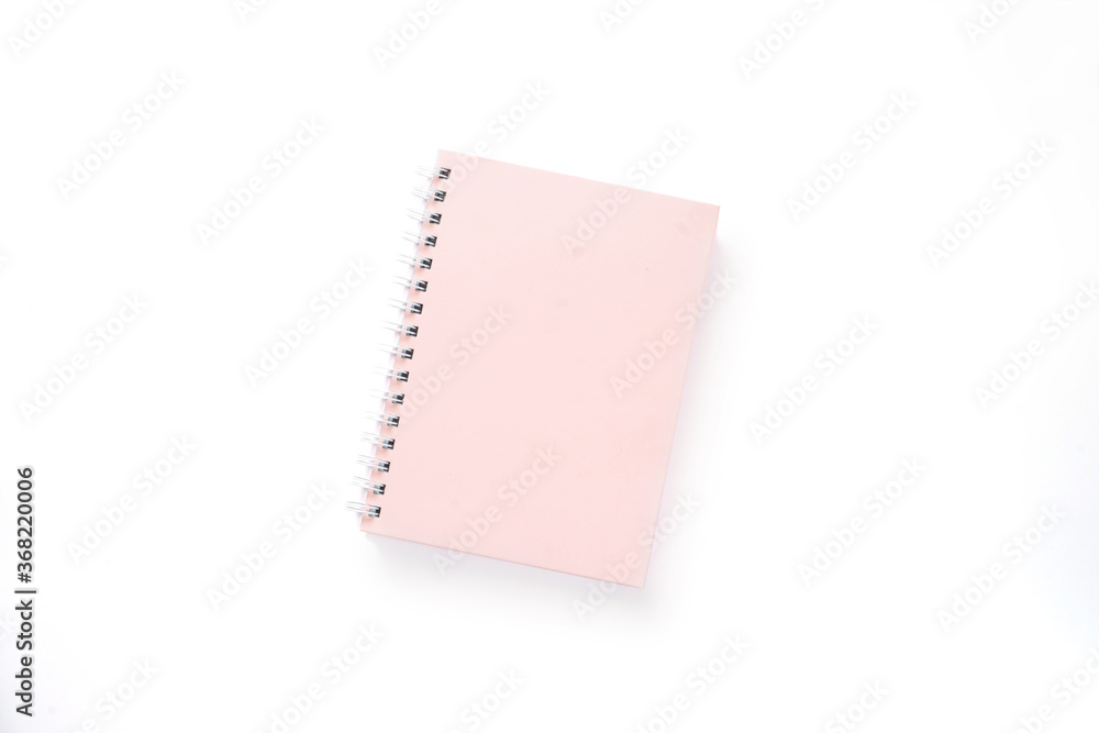 light pink notebook on white background with clipping path. mock up light pink notebook on white background with clipping path. mock up