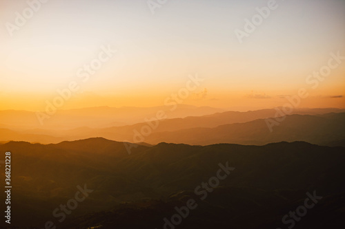 Wallpaper Mural View of silhouatte of mountain range under the sky during the sunset. Beautiful evening nature background. Torontodigital.ca
