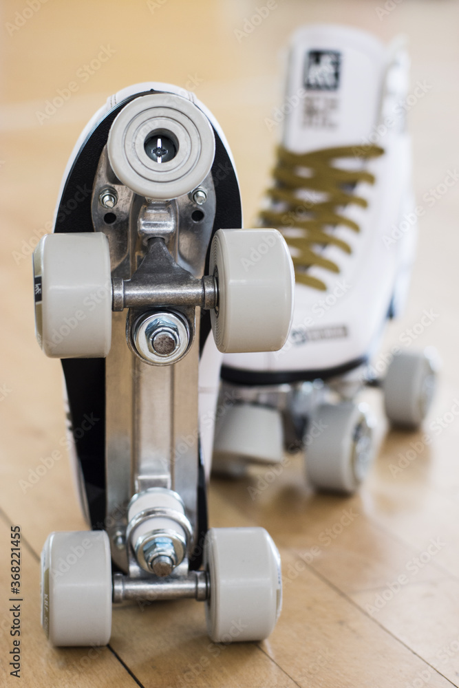 Naklejka premium Figure skates on the rink