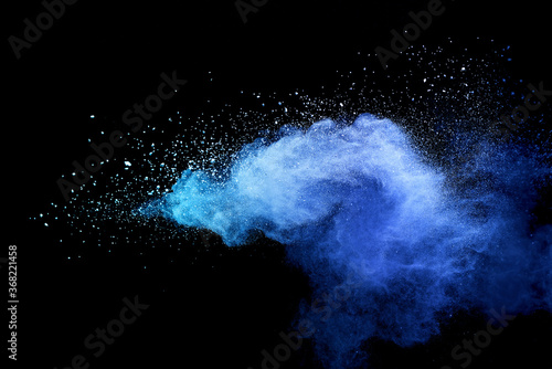 Closeup of blue dust particle splash isolated on black background.