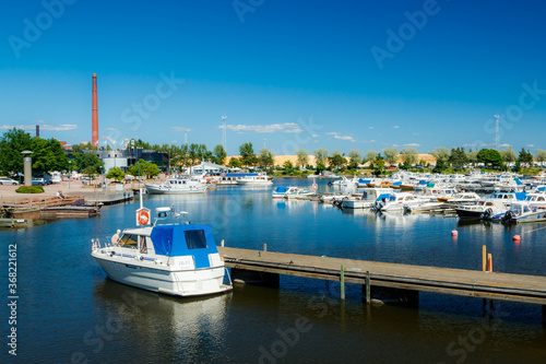 Kotka, Finland - 22 June 2020: A view on the parking of boats and yachts in the gulf Sapokka. photo