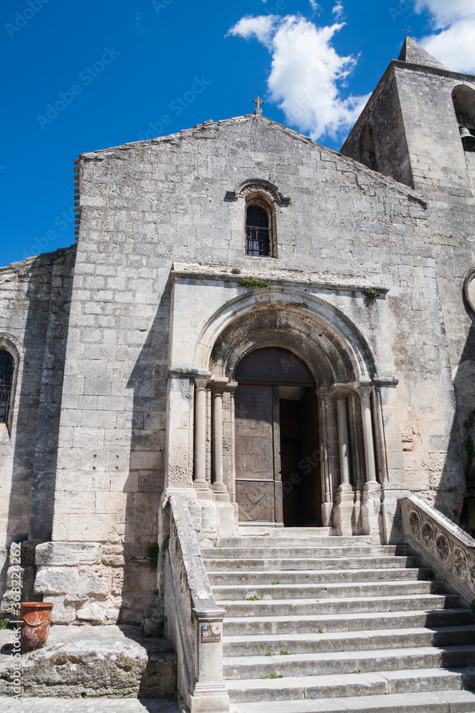 Facade of Saint Vincent church in the historic town of Les Baux de Provence in the south of France