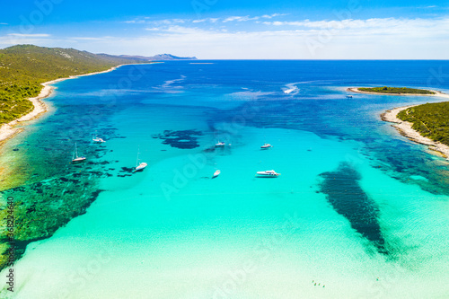 Fototapeta Naklejka Na Ścianę i Meble -  Beautiful Adriatic sea in Croatia. Aerial view of azure turquoise lagoon on Sakarun beach on Dugi Otok island, Croatia, yachts anchored in clear sea water.