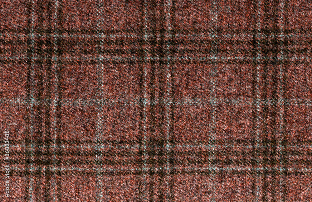 Fototapeta premium Lana vergine, cashmere. Expensive men's suit fabric. Brown Glenurquhart check is made of woolen fabric with a woven twill design of small and large checks. High resolution
