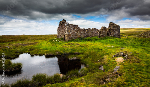 A ruined mine building on Grasssington moor lead mine trail. Yorkshire Dales National Park