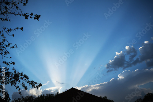 sun shining through the clouds